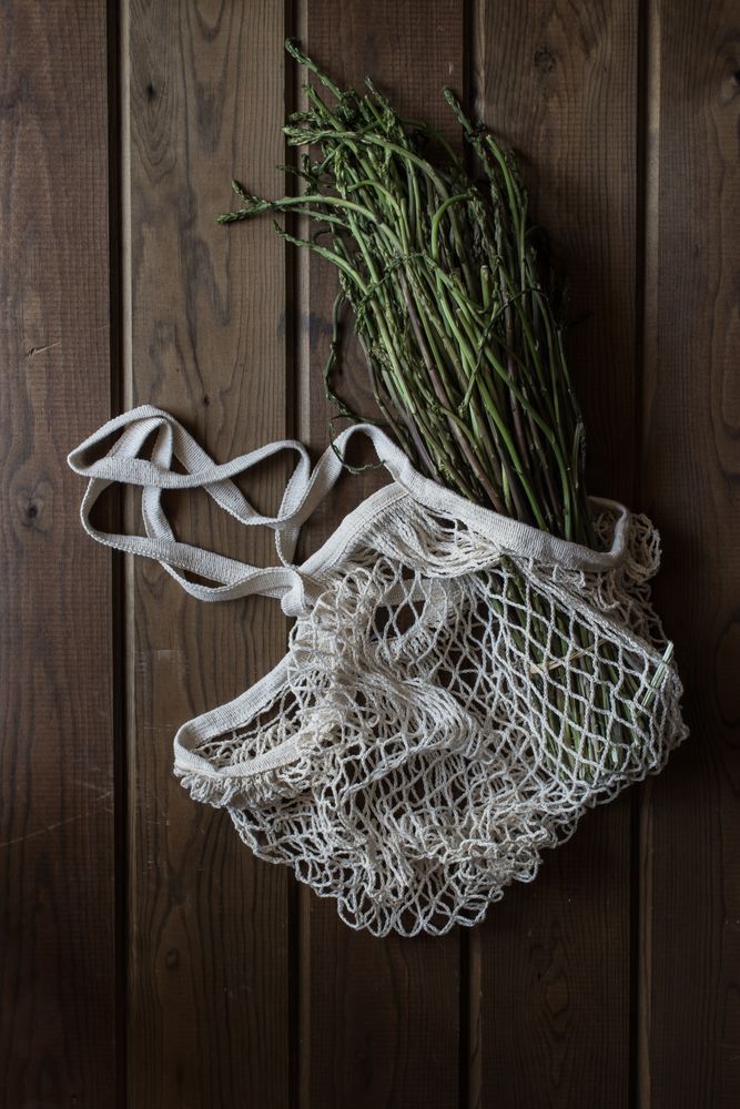 string bag with asparagus