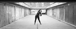 Woman in hijab stretching