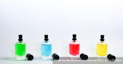Four colorful perfume bottles bxAzoy