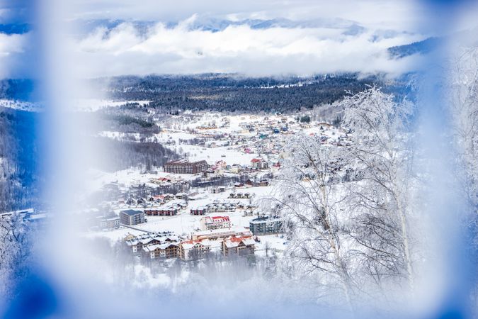 Georgian town seen through safety net on ski trail