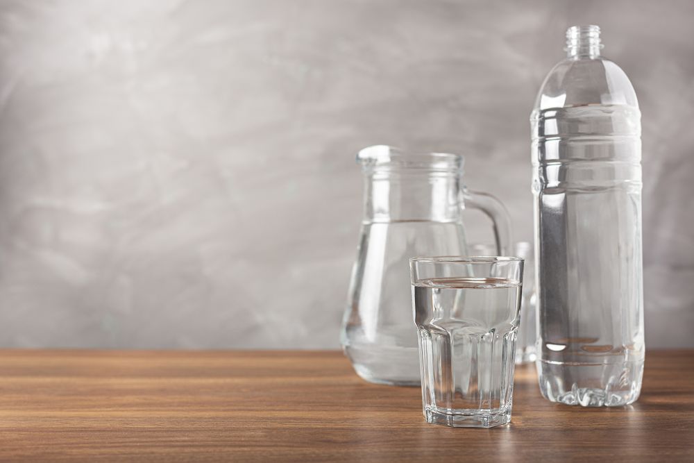 Glass of fresh water on the table.