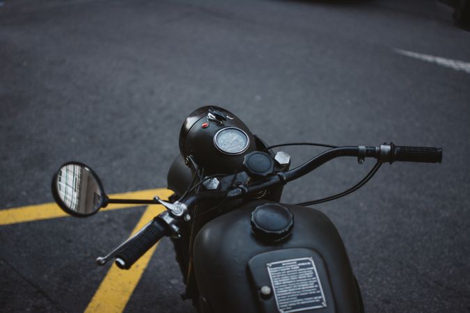 Motorbike on parking lot in town