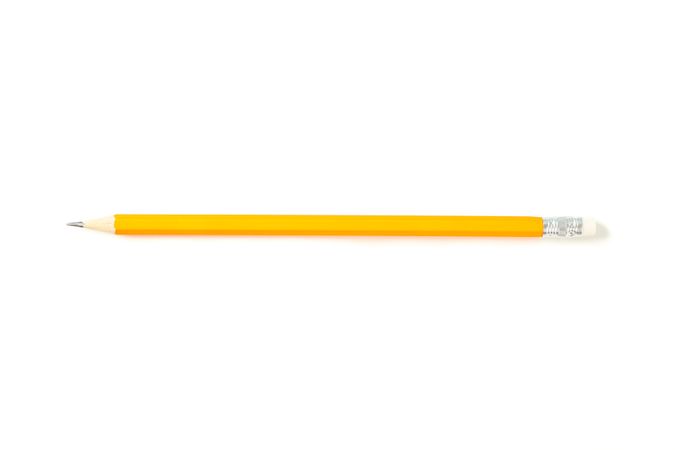 Pencil isolated on studio background, top view. Stationery