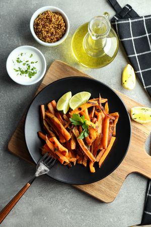 Fried sweet potato in a pan on the table