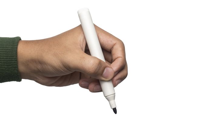 male hand holding whiteboard marker