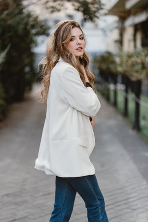 Charming woman posing on street