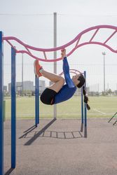 A young woman pulls-up at the stadium