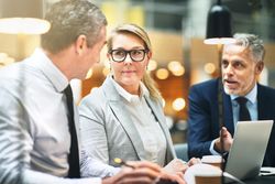Professionals having a discussing during a meeting