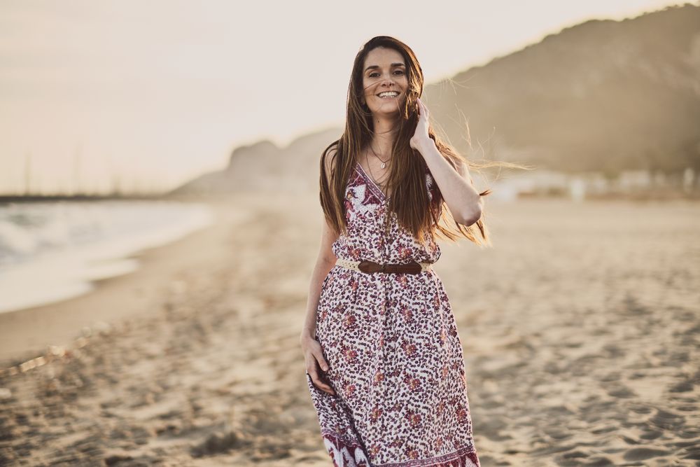 Woman with dress at the beach