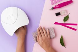 Top view of woman doing her manicure