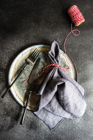 Cutlery set concept with red string