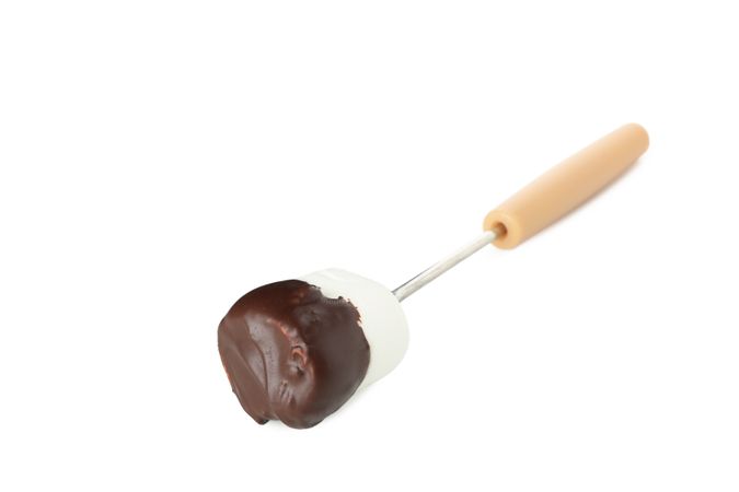 Marshmallow in chocolate isolated on blank background