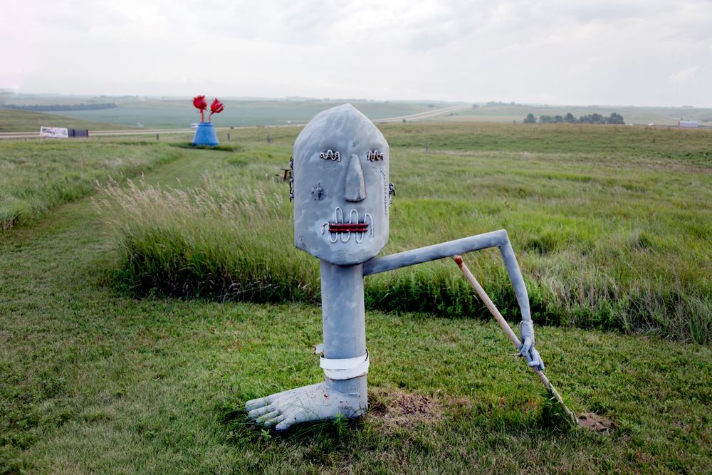 Surreal head on leg figure, Porter Sculpture Park, Montrose, South Dakota