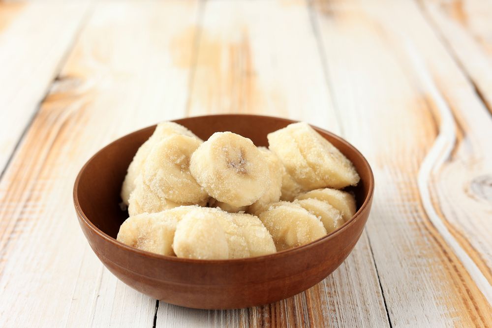 Frozen banana slices in bowl