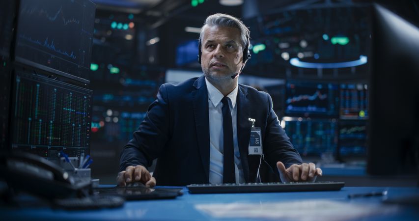Portrait of an Adult Man Working in an International Stock Exchange Company