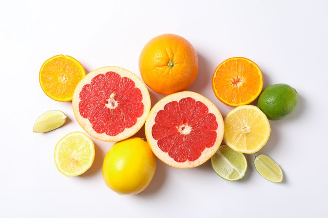 Composition with vegetables and fruits on blank background, space for text