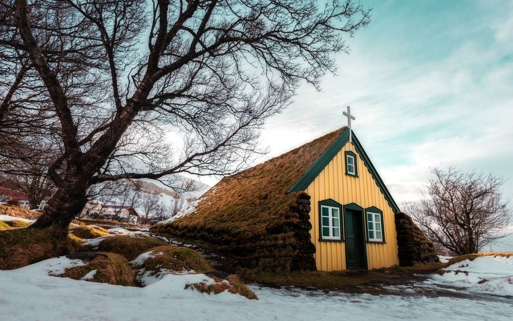 Landscape of turf church Hofskirkja in iceland