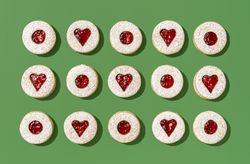 Christmas cookies on a green table, directly above view