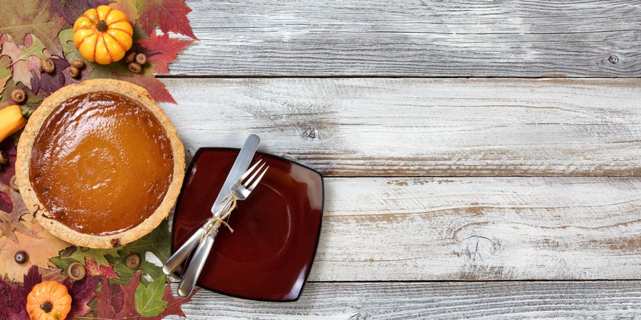Baked homemade pumpkin pie for Autumn dessert
