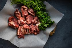 Raw meat and cilantro ready to cook