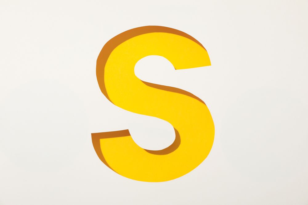 Color letter S on blank background, space for text