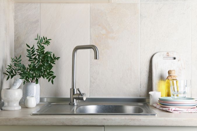 Kitchen interior with sink and different supplies