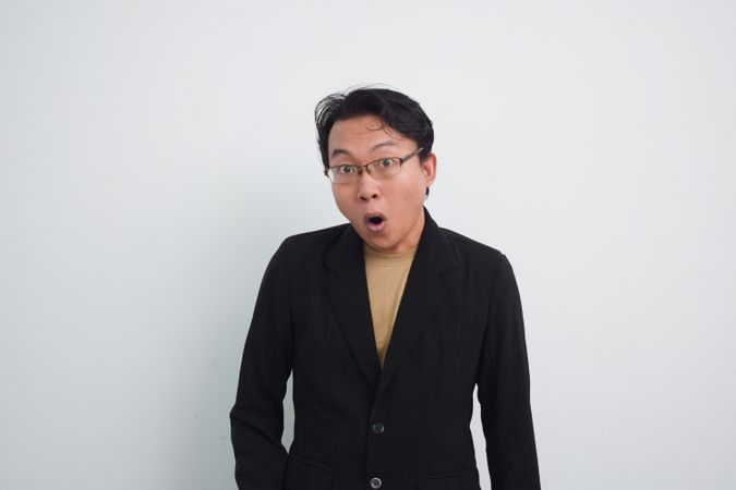 Asian Businessman with wow surprised expression