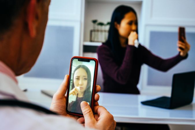 Concerned patient on video call with doctor