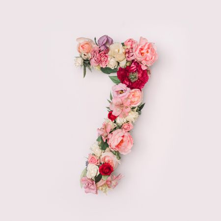 Number 7 made of real natural flowers and leaves