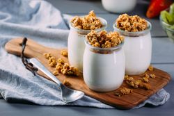 Glass bottles with milk and walnuts