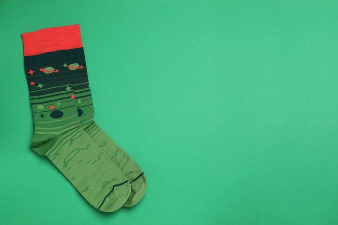 Casual clothes and wearing concept - socks, clothes for foot