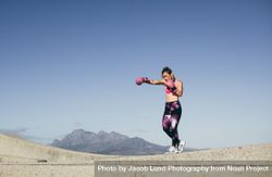 Fit young woman punching workout 4AzGQm