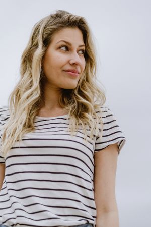 Portrait of young woman on neutral background