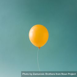 Yellow balloon on blue sky 5ajzv4