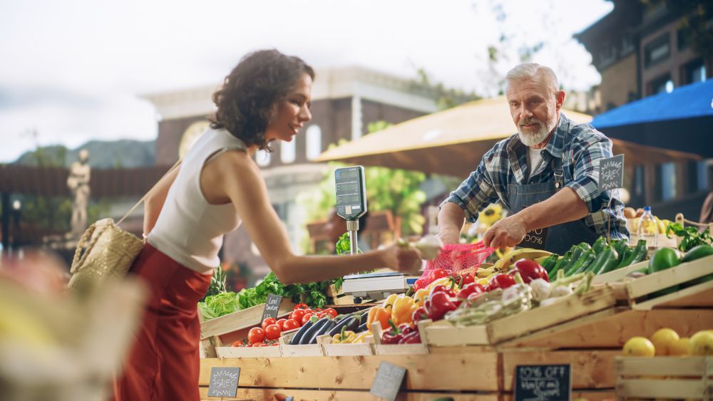 Cheerful Local Farmer Running a Small Business, Selling Sustainable Farm Fruits and Vegetables.