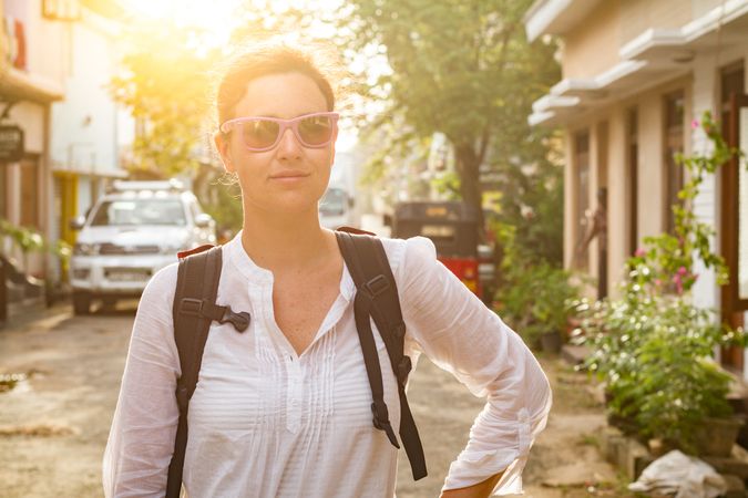 Female traveler on town street