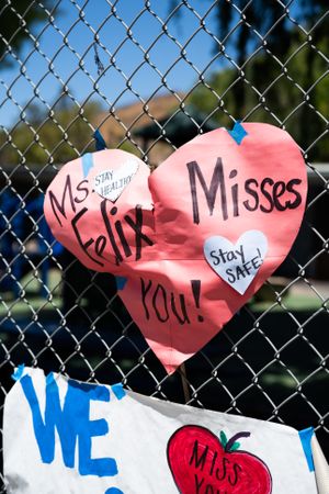 Close up of heart-shaped sign from teacher missing her students during lockdown