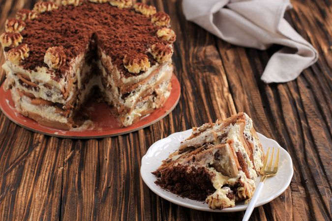 A slice of Tiramisu Cake on a Plate