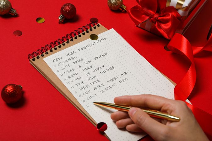 Concept of New Year Resolutions list, new year goals, close up