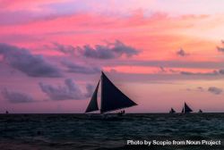 Silhouette of boats sailing in sea during sunset bG6Xx4