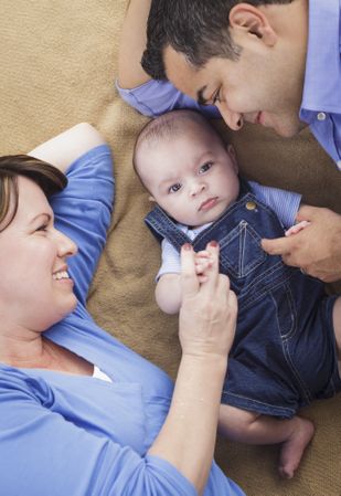 Family Playing on the Blanket