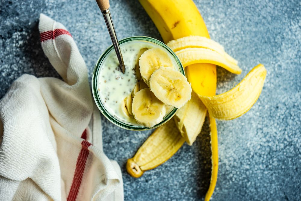 Mason jar of breakfast with chia seeds and bananas