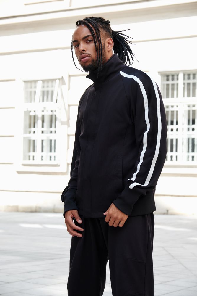 Black male standing on the street