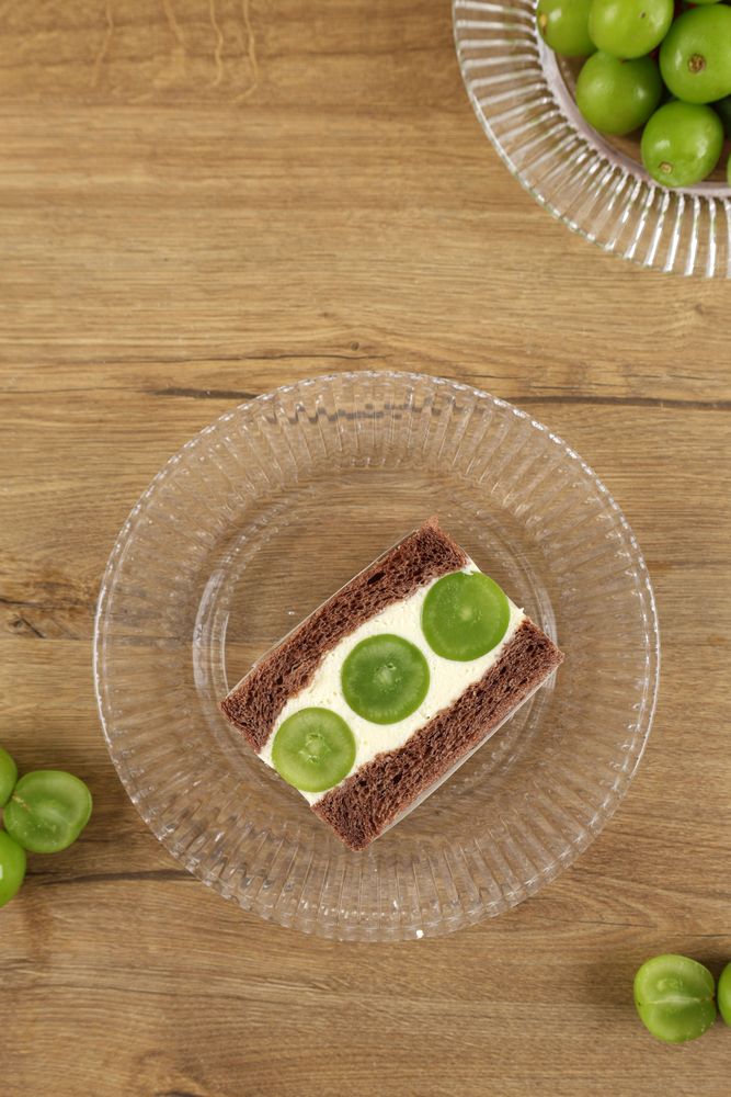 Top View Shine Muscat Grapes Japanese Sandwich with Chocolate Bread and Cream