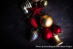 Red & Golden Christmas baubles on wooden background bGd6x0