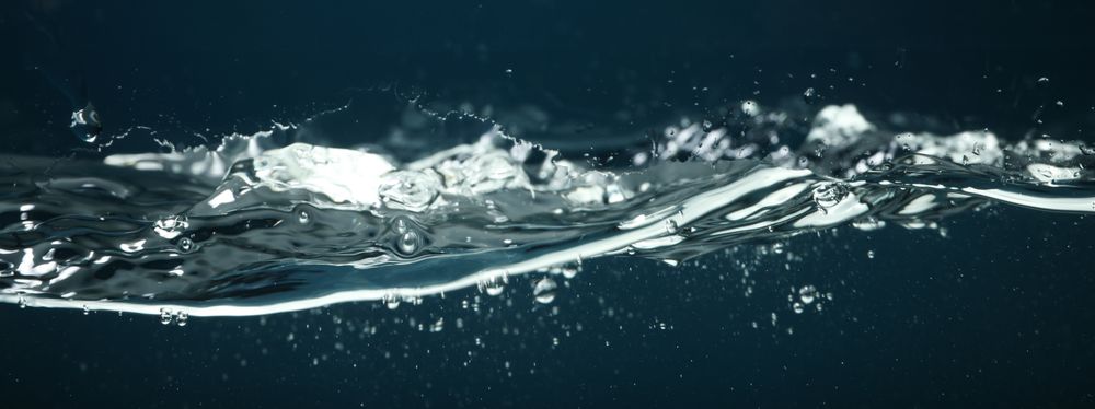 Banner side view of wave on dark background