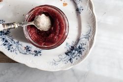 Glass jar of fresh strawberry jam