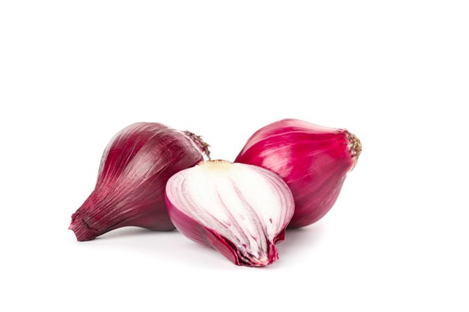 Fresh red onion isolated on blank background