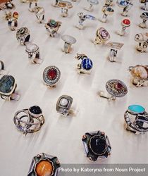 Top view of row of rings with multi-colored gems 5kk3A5