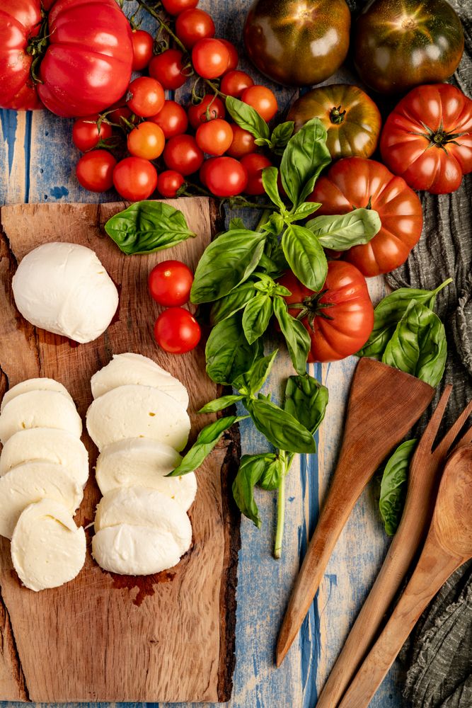 Salad ingredients on board and napkin